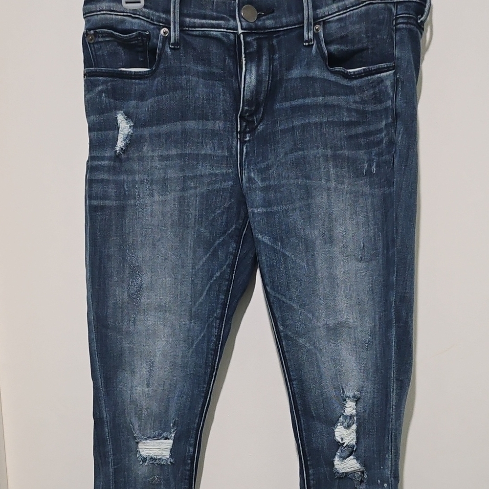 Distressed Blue Jeans